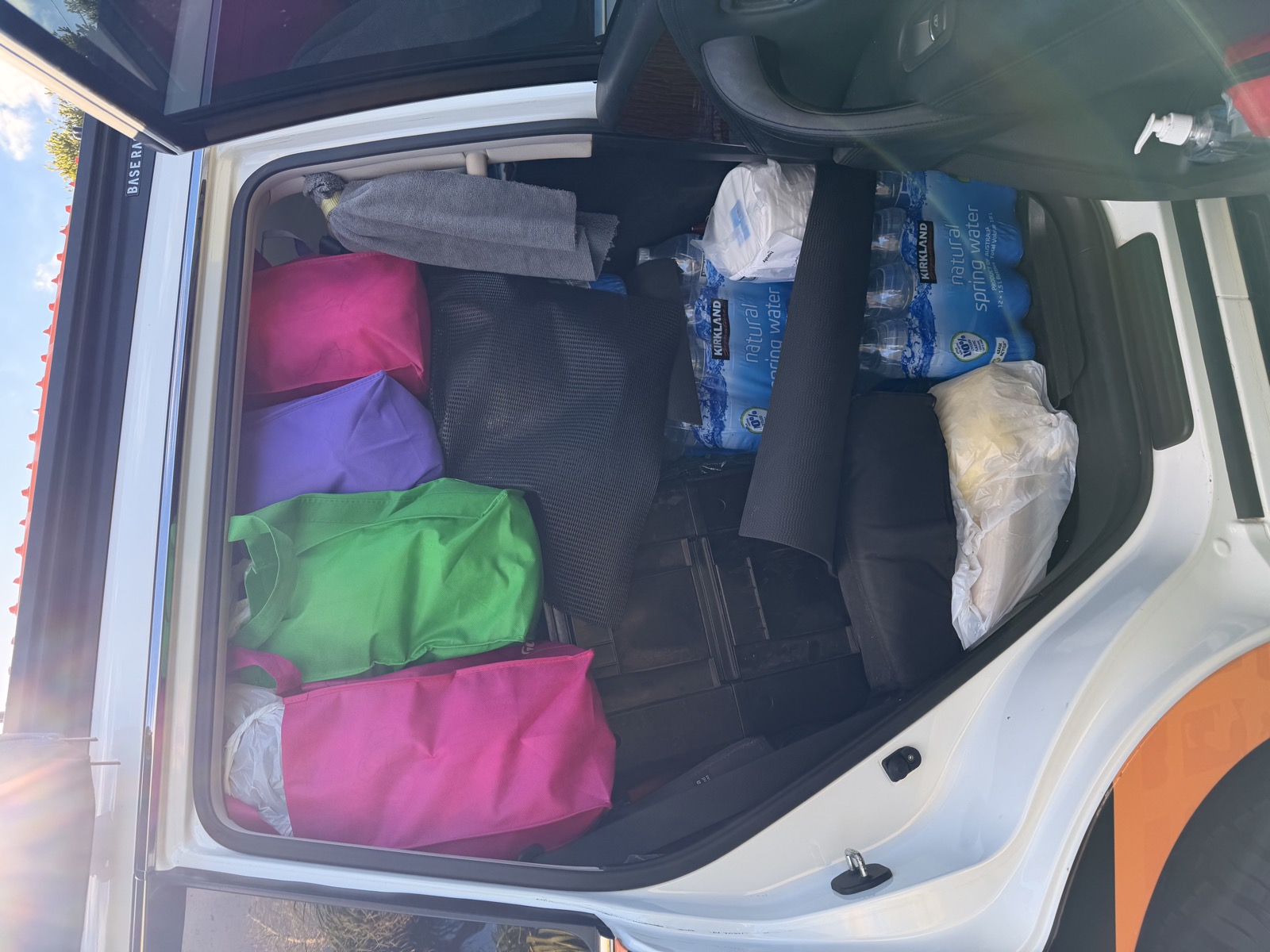 A four-wheel-drive boot packed with dry bags and water