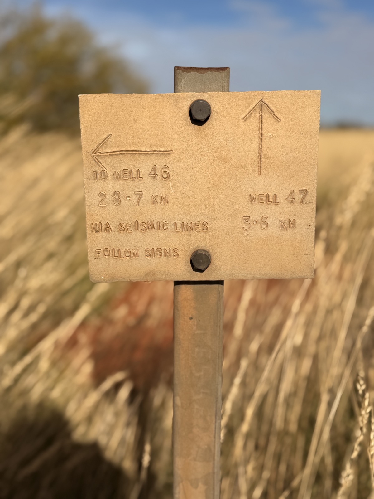 A sign reading To Well 46, 28.7 km